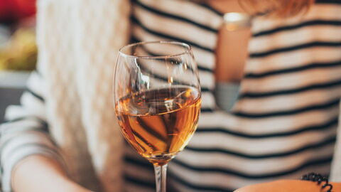 A woman enjoying wine