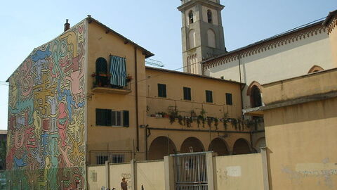 Haring's Tuttomondo on the side of S. Antonio in Pisa
