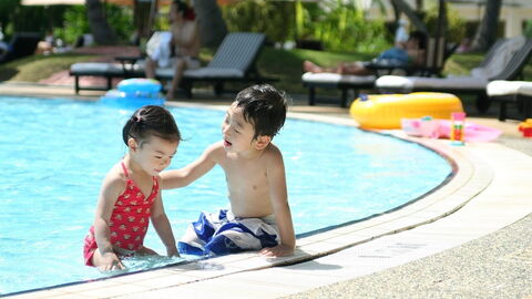 A family at the pool