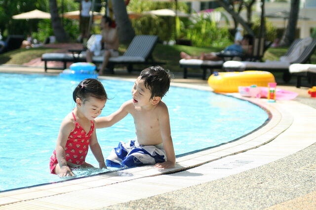 A family at the pool