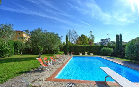 Villa Fiamma: Cloud, Plant, Water, Sky, Property, Swimming Pool, Azure, Tree, Body Of Water, Shade