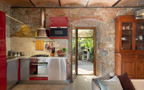 Villa Fracassini: Furniture, Plant, Kitchen, Building, Door, Wood, Kitchen Appliance, Interior Design, Window, Architecture