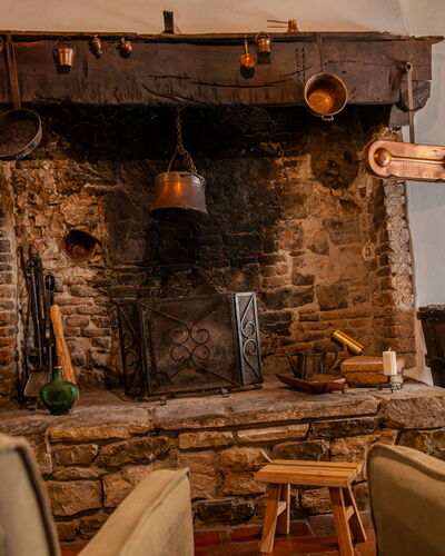 Casa Di Vignolo: Furniture, Wood, Interior Design, Lighting, Living Room, Room, Chair, Hearth, Hardwood, Natural Material