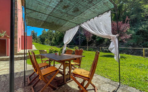 Mulino a Montegonzi Di Rimaggio: Plant, Table, Furniture, Outdoor Table, Shade, Building, Outdoor Furniture, Chair, Tree, Leisure