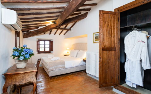 Villa Le Corti: Wall, Furniture, Bedroom, Bed, Home, Floor, Flooring, Interior Design, Bed Frame, Ceiling