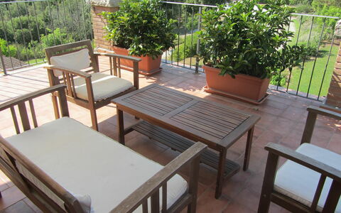 Villa Di Seripa: Furniture, Property, Table, Outdoor Table, Chair, Room, Patio, Hardwood, Balcony, Outdoor Furniture