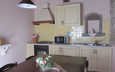 Villa Di Seripa: Cabinetry, Countertop, Mirror, Property, Furniture, Building, Sink, Drawer, Wood, Kitchen