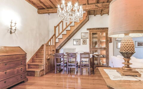 La Casetta: Room, Property, Interior Design, Ceiling, Stairs, Furniture, Building, Wood Flooring, Chandelier, Lighting
