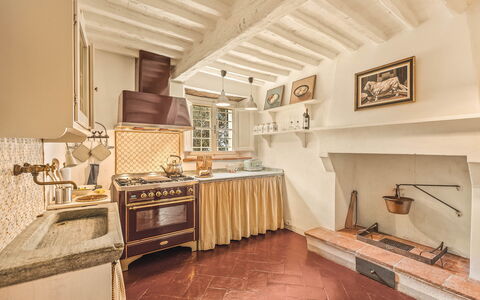 Il Vignale: Wood, Flooring, Interior Design, Kitchen, Home, Floor, Kitchen Stove, Cabinetry, Stove, Room