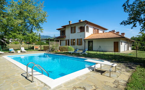 Villa Cinzia: Sky, Water, Plant, Building, Property, Window, Swimming Pool, Tree, Azure, House