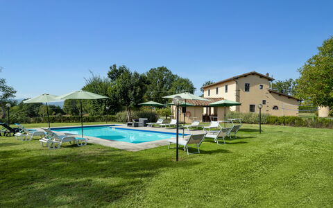 Villa La Collina: Sky, Plant, Water, Property, Building, Tree, Swimming Pool, Window, Shade, Outdoor Furniture