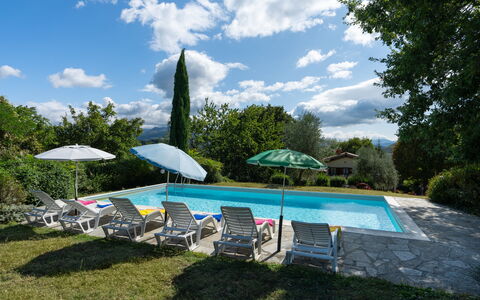Casa Corella: Cloud, Sky, Plant, Water, Umbrella, Building, Swimming Pool, Tree, Shade, House