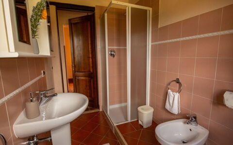 Collina dei Fiori: Bathroom, Property, Room, Toilet, Wall, Plumbing Fixture, Tile, Toilet Seat, Bathroom Sink, Floor