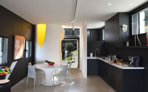 Casa Farfalla: Furniture, Interior Design, Flooring, Light Fixture, Ceiling, Lighting, Chair, Table, Kitchen, Kitchen & Dining Room Table