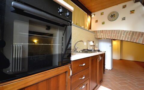 Appartamento Passerini: Countertop, Property, Room, Cabinetry, Kitchen, Furniture, Building, Interior Design, Home, Lighting