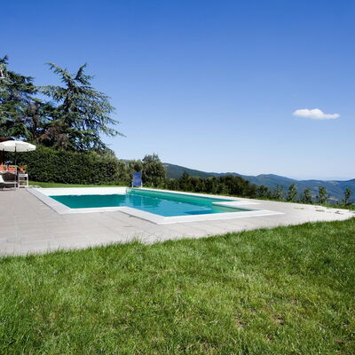 Casa Cristina: Property, Swimming Pool, Real Estate, House, Residential Area, Home, Grass, Estate, Land Lot, Building