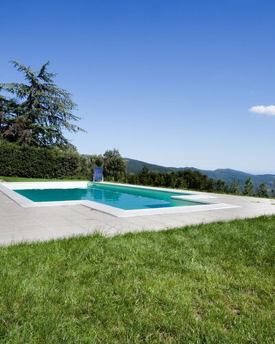 Casa Cristina: Property, Swimming Pool, Real Estate, House, Residential Area, Home, Grass, Estate, Land Lot, Building