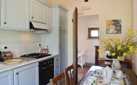 Villa San Pietro: Room, Property, Countertop, Kitchen, Furniture, Building, House, Yellow, Cabinetry, Home