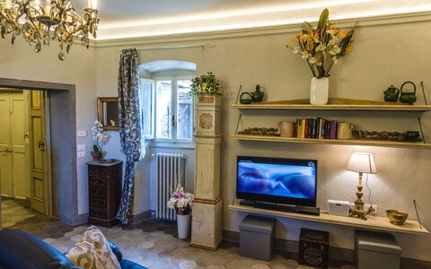 Michelangelo Cortona Apartment: Room, Living Room, Property, Interior Design, Blue, Furniture, Home, Building, House, Fireplace