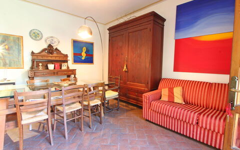 Residenza Marechiaro: Furniture, Property, Table, Picture Frame, Building, Wood, Interior Design, Architecture, Chair, Floor