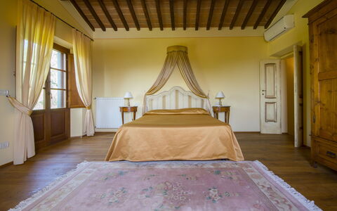 Villa Il Sasso: Bedroom, Room, Property, Bed, Furniture, Yellow, Bed Sheet, Interior Design, Ceiling, House