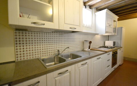 Villa Il Palazzone: Property, Room, Countertop, Cabinetry, Kitchen, Furniture, Sink, Interior Design, Building, House