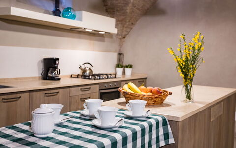 Appartamento La Corte: Tableware, Table, Property, Furniture, Dishware, Plant, Flower, Green, Building, Interior Design