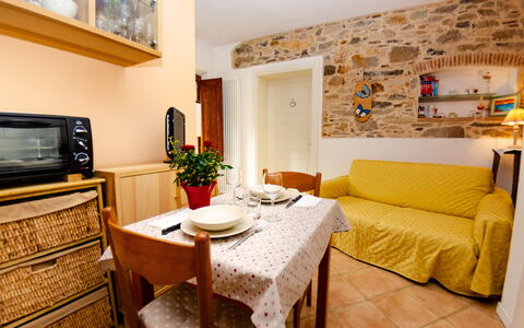 La Piccola Margherita: Room, Furniture, Property, Living Room, Interior Design, Yellow, Building, Table, Real Estate, House