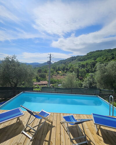 Alla Piazzetta Proprietà: Blue, Swimming Pool, Eco Hotel, Resort, Reflection, Thermae, Resort Town, Outdoor Furniture, Hotel, Villa