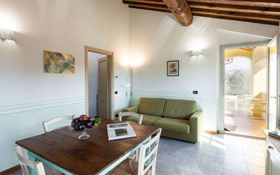 Libellula: Table, Property, Furniture, Couch, Picture Frame, Wood, Lighting, Interior Design, Architecture, Living Room