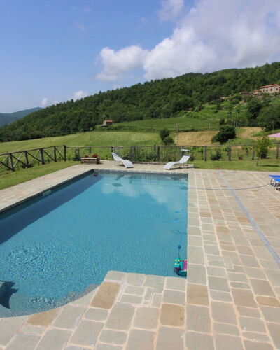Poggio del Fabbro: Water, Sky, Cloud, Property, Building, Swimming Pool, Azure, Outdoor Furniture, Shade, Chair