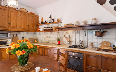 Casa La Rotta: Countertop, Room, Kitchen, Property, Cabinetry, Furniture, Interior Design, Building, House, Floor