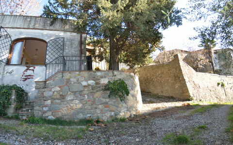 La Cipressa: Wall, Property, Building, Tree, House, Ruins, Architecture, Land Lot, Stone Wall, Rock