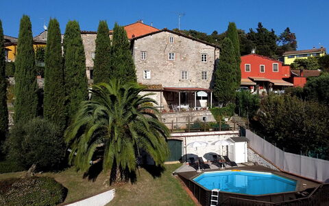 Borgo Bucatra Buonvento: Building, Plant, Property, Sky, Azure, Tree, House, Arecales, Residential Area, Water