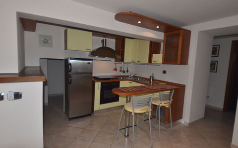 Villa Vaniglia Proprietà: Room, Property, Furniture, Kitchen, Building, Countertop, House, Cabinetry, Floor, Apartment