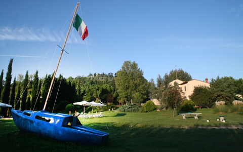 Agriturismo Girasole: Sky, Boat, Flag, Water Transportation, Vehicle, Tree, Watercraft, River, Landscape, Lake