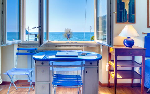 Apartment Mare Bello - Levanto: Blue, Room, Furniture, Majorelle Blue, Table, Property, Azure, Interior Design, Building