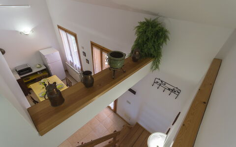 Calanchi Apartments: Property, Room, House, Interior Design, Real Estate, Furniture, Building, Floor, Houseplant, Stairs