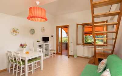 Erica - Pool View First Floor: Interior Design, Furniture, Wood, Flooring, Floor, Ceiling, Room, Wood Stain, Chair, Living Room