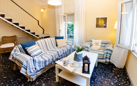 Angelina: Room, Furniture, Property, Living Room, Interior Design, Blue, Yellow, Building, Bedroom, Real Estate