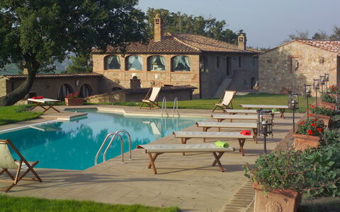Villa Fontanelle: Plant, Water, Property, Building, Sky, Swimming Pool, Tree, Shade, Outdoor Furniture, Chair