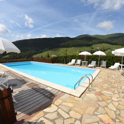 Podere Di Mero Casolare: Sky, Cloud, Water, Building, Swimming Pool, Sunlounger, Outdoor Furniture, Umbrella, Shade, Chair