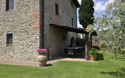 Villa Claudia: Plant, Window, Building, Flowerpot, Houseplant, Cloud, House, Tree, Grass, Shrub