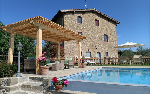 Villa Claudia: Plant, Water, Sky, Property, Flower, Building, Shade, Swimming Pool, Leisure, Tree