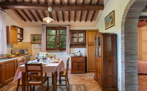 Villa Laura: Cabinetry, Furniture, Table, Wood, Picture Frame, Drawer, Interior Design, Chair, Countertop, Kitchen