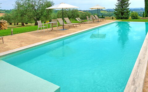 Villa Le Buche: Water, Plant, Property, Swimming Pool, Sky, Green, Tree, Blue, Azure, Shade