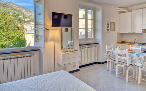 Studio Paola - Levanto: Cabinetry, Furniture, Property, Window, Table, Building, Window Blind, Drawer, Azure, Chest Of Drawers