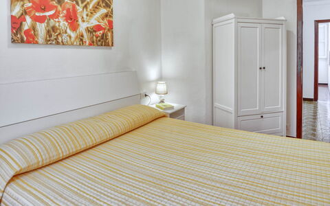 Nina Home - Levanto: Furniture, Property, Comfort, Door, Building, Wood, Textile, Orange, Shade, Interior Design