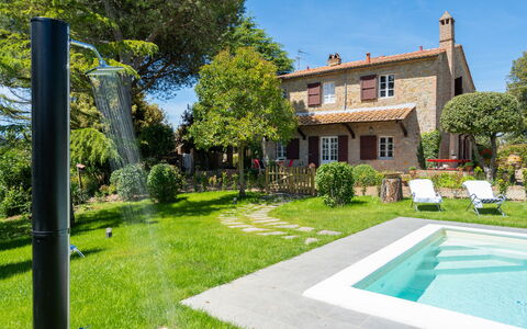 Villa Luana: Plant, Building, Sky, Property, Window, Green, Water, Tree, House, Land Lot