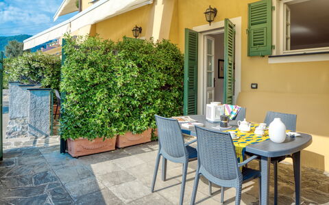 Villa Dell'erta - Levanto, Montale: Plant, Building, Furniture, Table, Window, Green, Azure, Chair, Flowerpot, Architecture